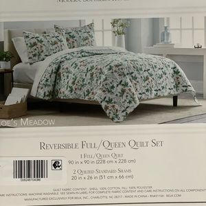 Brand new reversible full/queen quilt set.